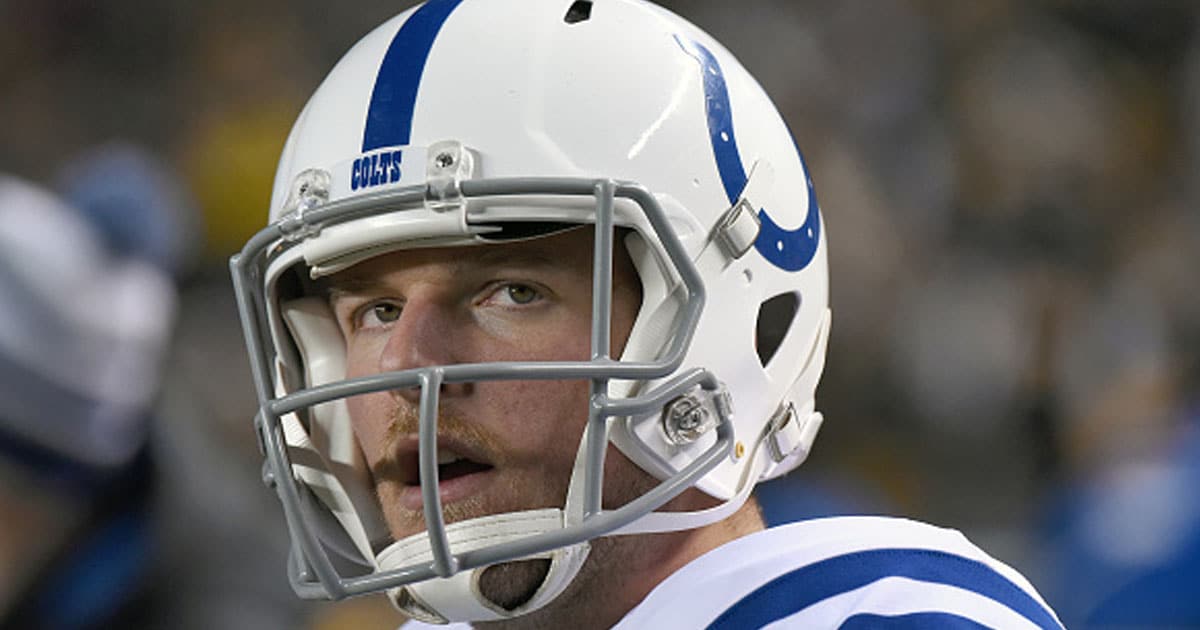 Pat McAfee of the Indianapolis Colts looks on from the sideline during a game against the Pittsburgh Steelers
