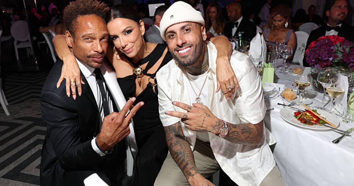 Gary Dourdan, Eva Longoria and Nicky Jam attend the photocall for the Global Gift Gala during the 75th annual Cannes film festival 