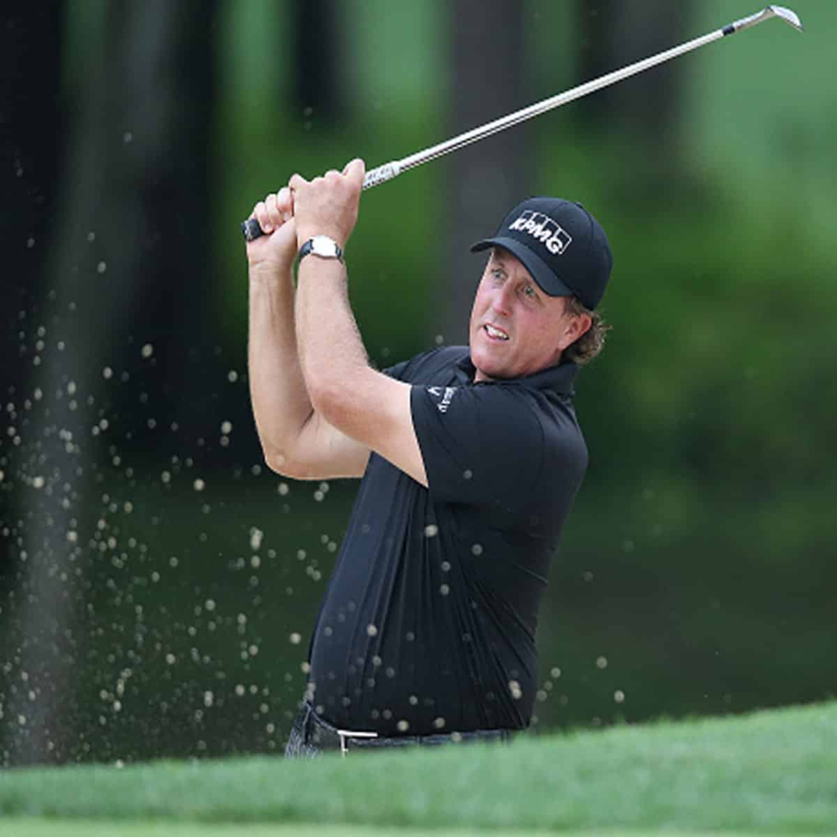 Phil Mickelson hits from a bunker during the fourth round of the PGA Championship