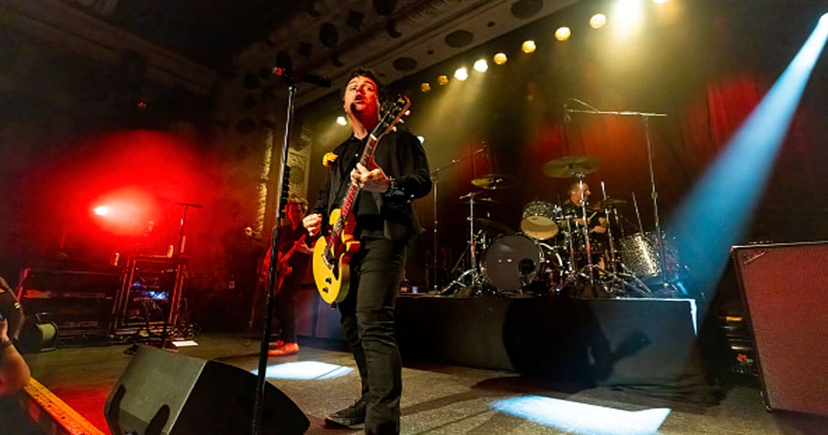 Billie Joe Armstrong (L) and Tre Cool of Green Day performs live at the Lollapalooza After Party 